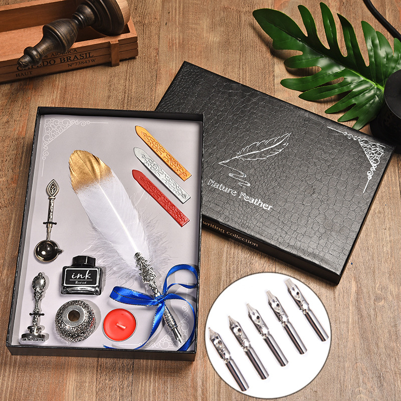 WTY006 Vintage British feather dipped pen in water